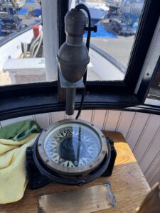 Compass and light from Sand Man tugboat